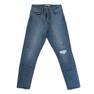 Levi's Straight Leg Jeans in Medium Blue with Distressed Detailing